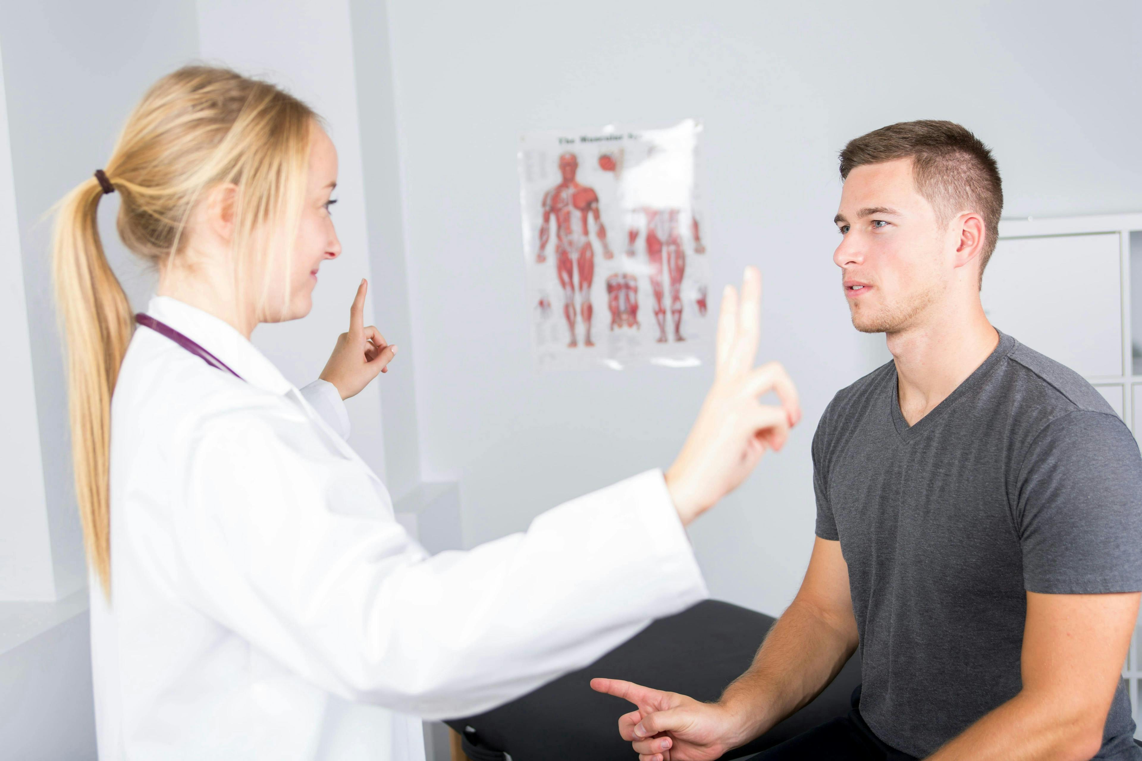 Doctor talking to person with a brain injury